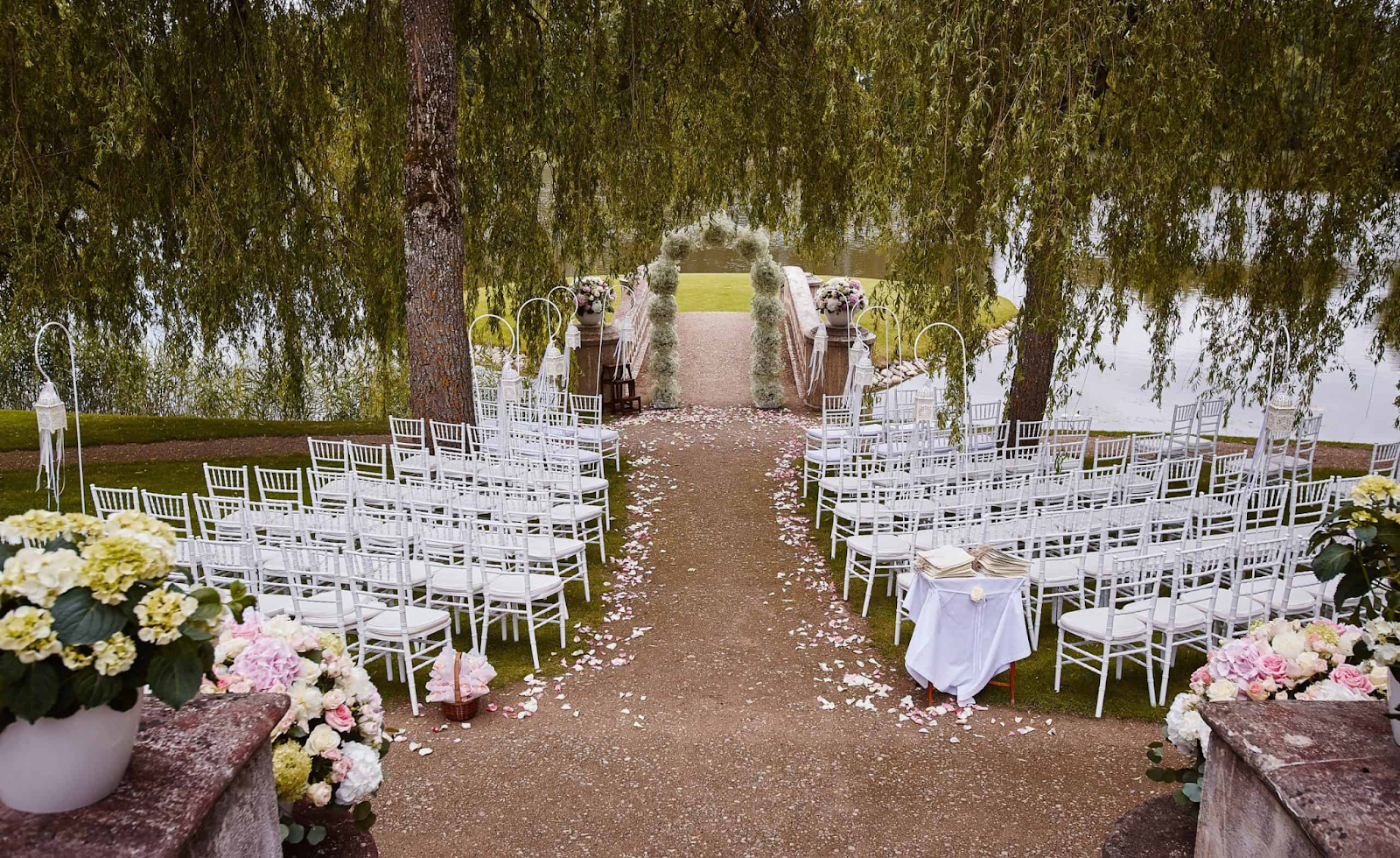 outdoor wedding example in Malaysia by the lake with trees